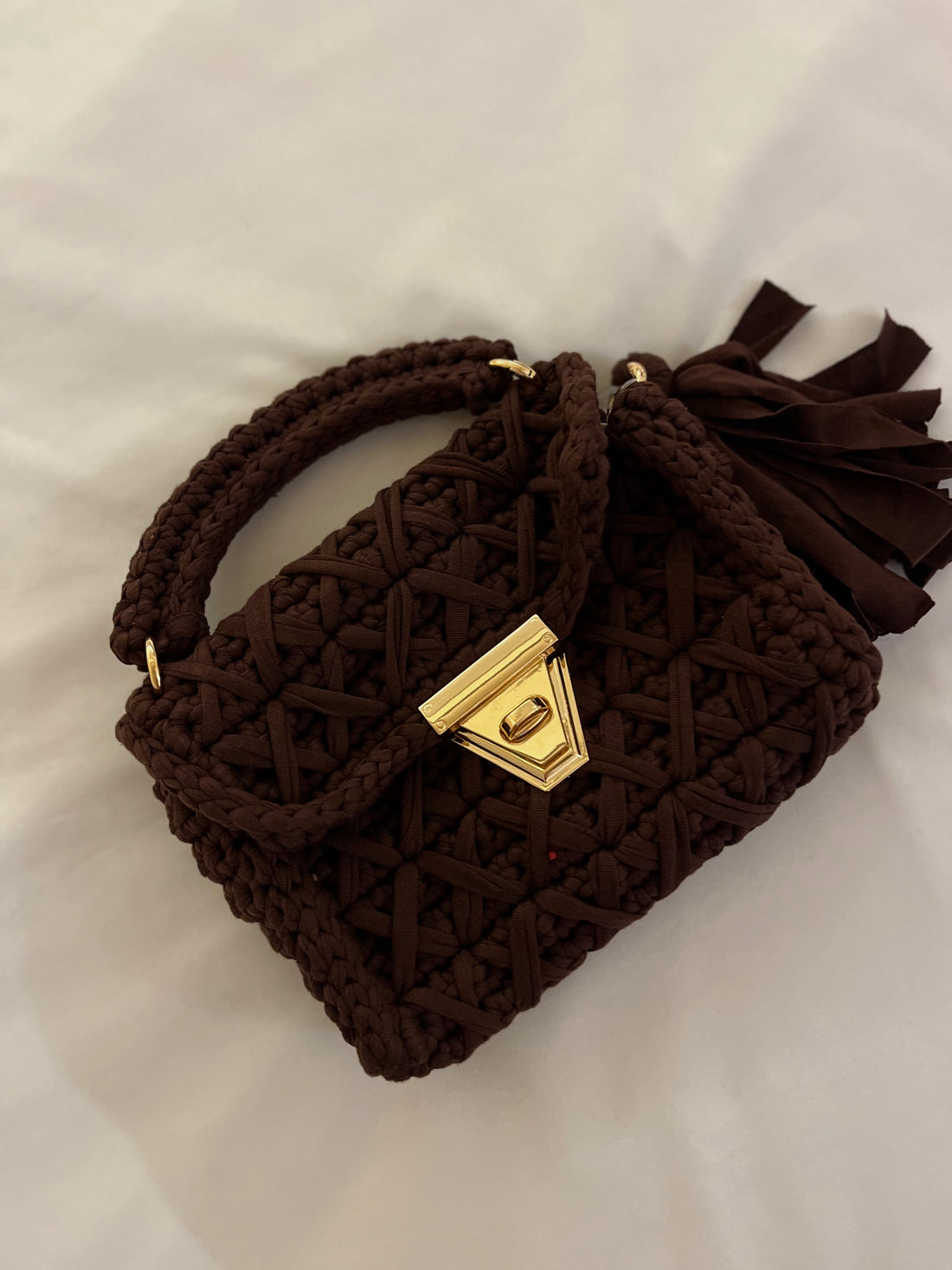 Pochette Mini intrecciata con chiave - marrone